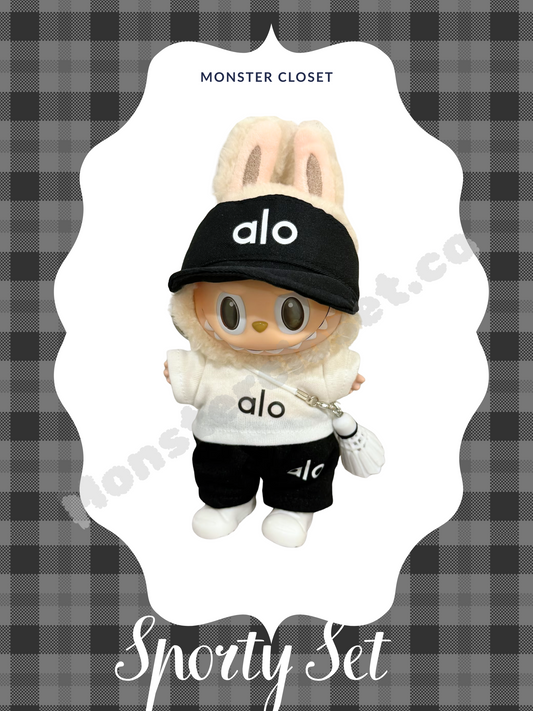 Monster Closet Labubu outfit wearing a black cap and outfit with 'alo' branding on a checkered background. a37-1