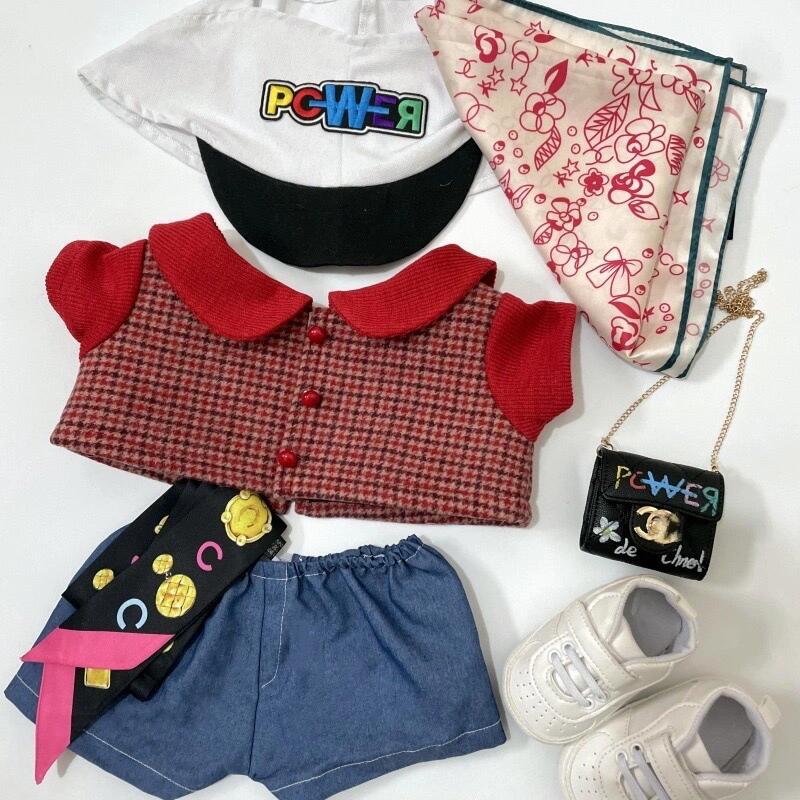 Monster Closet Labubu cloth inspired by G-Dragon, consist with a red checkered shirt, blue pants, and a white hood with red patterns